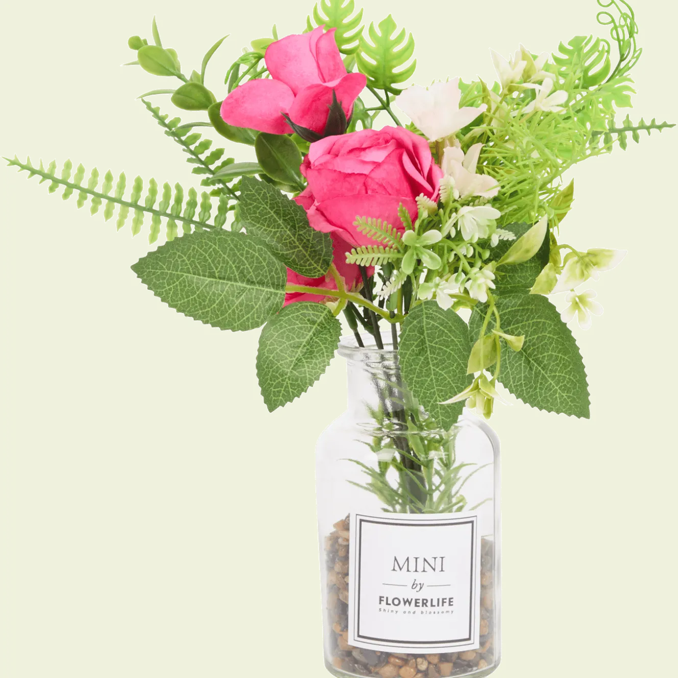 Kunstbloemen in glazen fles